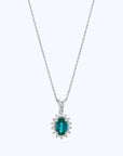14K White gold necklace with 0.65 carat Emerald and 0.13 carat White Diamonds